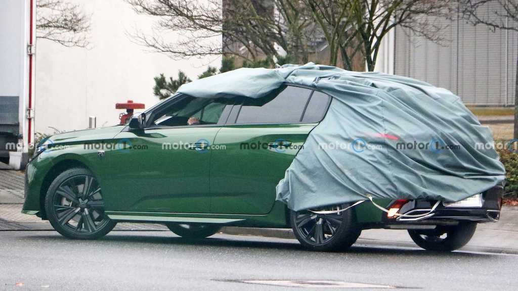 Peugeot đem ốp bộ mặt dữ dằn của SUV vào hatchback 308, tiên phong sử dụng logo mới ảnh 4