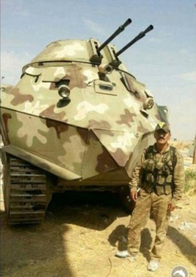 Xem xe bọc thép tự chế siêu dị của ISIS tại Iraq ảnh 2